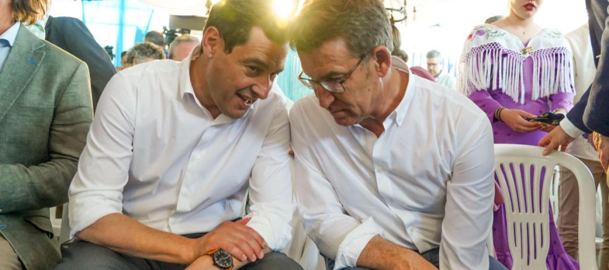 Moreno Bonilla y Núñez Feijóo charlan en un reciente acto