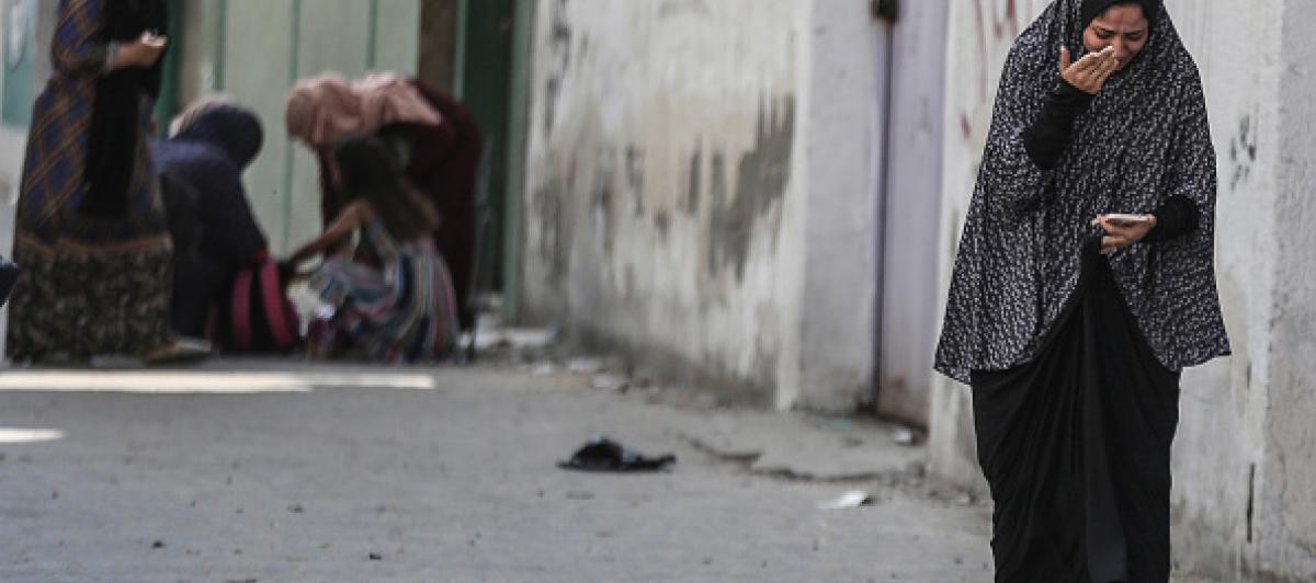 Una mujer palestina llorando tras un ataque de Israel en Gaza.