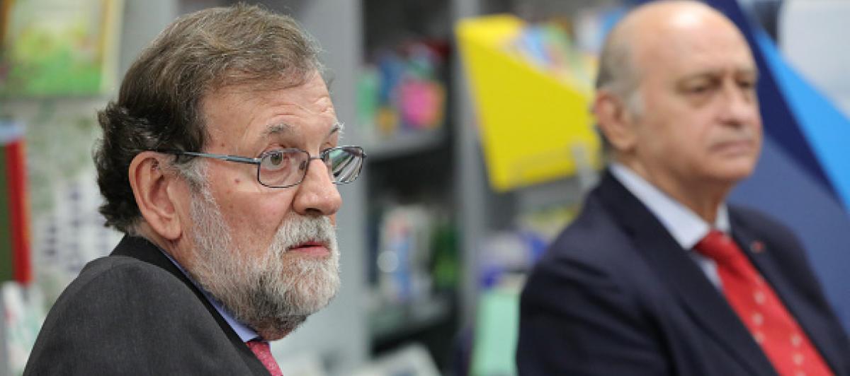 El expresidente del Gobierno Mariano Rajoy y su exministro de Interior Jorge Fernández Díaz, en una imagen de archivo.