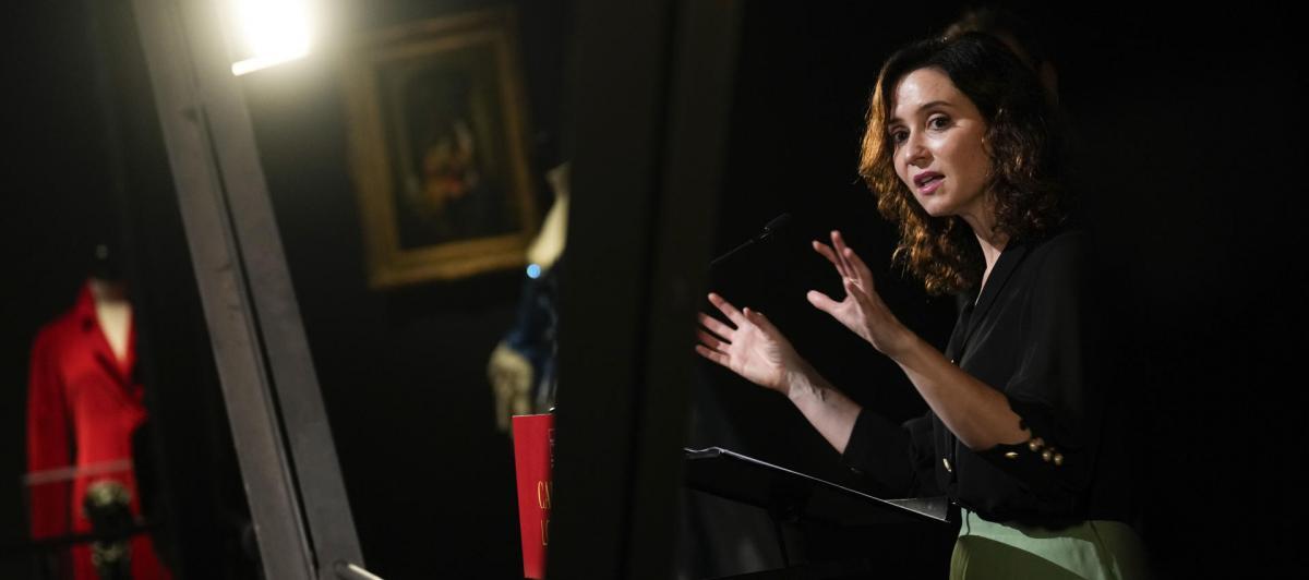 La presidenta de la Comunidad de Madrid, Isabel Díaz Ayuso, inaugura la muestra 'Lorenzo Caprile', un viaje por los vestidos más icónicos del modista, este martes, en la Sala Canal de Isabel II en Madrid.