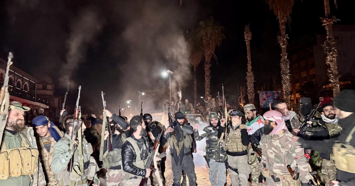 Rebeldes de Siria tras entrar en Damasco.