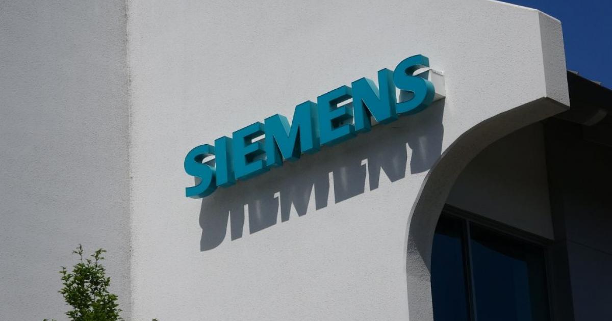 Close-up of sign with logo for industrial automation company Siemens at Silicon Valley headquarters in Mountain View, California, May 3, 2019. (Photo by Smith Collection/Gado/Getty Images)