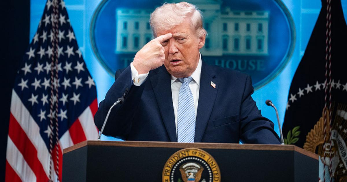 UNITED STATES - APRIL 6: President Donald Trump mimics a Iranian protester being shot, while he conducts a news conference about the war in Iran in the White House briefing room on Monday, April 6, 2026. (Tom Williams/CQ-Roll Call, Inc via Getty Images)