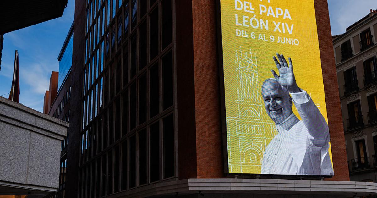MADRID, SPAIN - JUNE 04: Illuminated screens depicting Pope Leo XIV on June 04, 2026 in Madrid, Spain. Pope Leo XIV will make a trip to Spain from June 6-12, with stops in Madrid, Barcelona and the Canary Islands.  (Photo by Dan Kitwood/Getty Images)