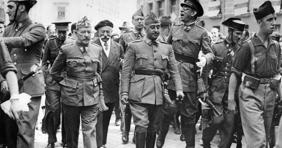 SPAIN - CIRCA 1900:  General Francisco Franco, commander in the south, is visiting the headquater of the Northern Front in Burgos. F.l.t.r.: General Cavalcanti, General Francisco Franco Bahamonde and the Nationalist commander in the north General Emilio Mola Vidal (with glasses). Burgos. Photograph. August 19, 1936.  (Photo by Imagno/Getty Images)