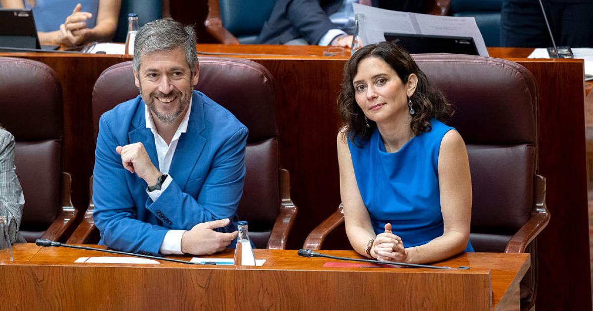 SPAIN - JUNE 11: The Regional Minister of the Presidency, Justice and Local Administration, and spokesperson for the regional government, Miguel Angel Garcia Martin, and the President of the Community of Madrid, Isabel Diaz Ayuso, during a plenary session of the Assembly of Madrid, on 11 June, 2026 in Madrid, Spain. The Assembly of Madrid approves the reform of the Rules of Procedure of the Chamber to introduce the legislative footprint and regulatory traceability, in a session that still echoes the recent visit of Pope Leo XIV to the region. (Photo By Alberto Ortega/Europa Press via Getty Images)