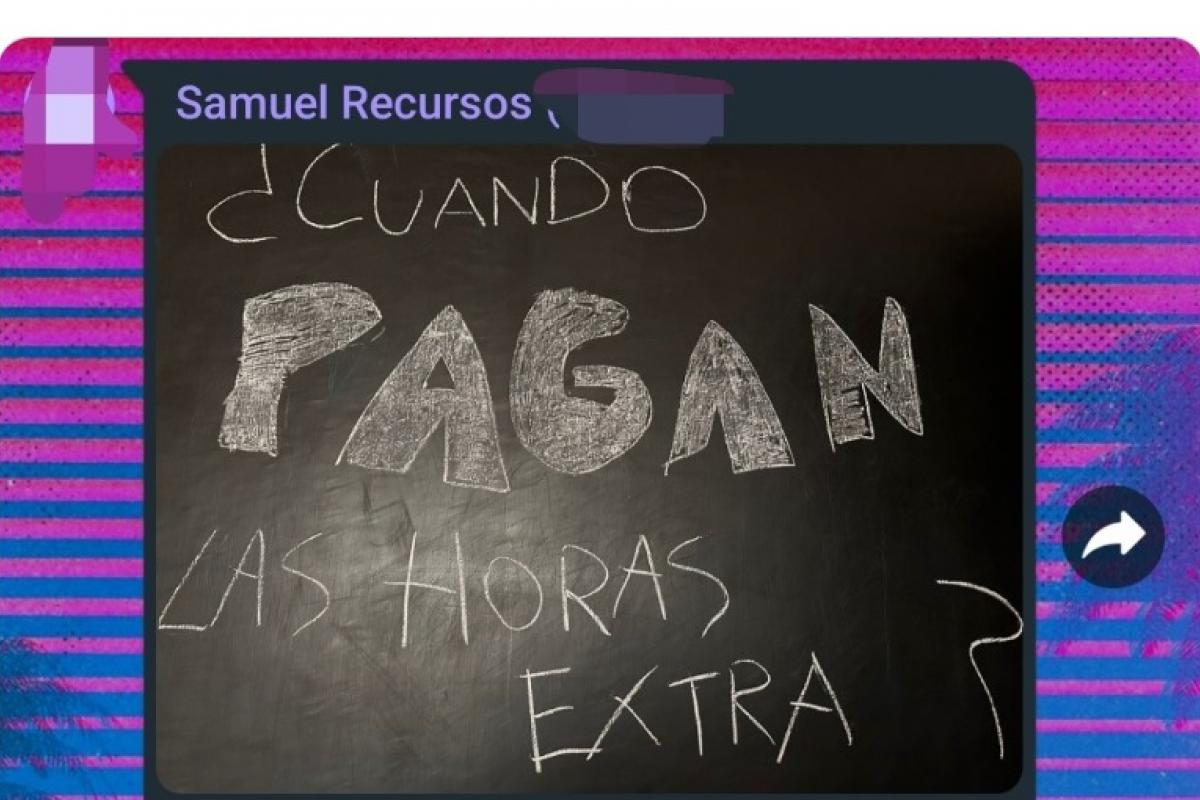 La pintada hecha en la pizarra de una empresa