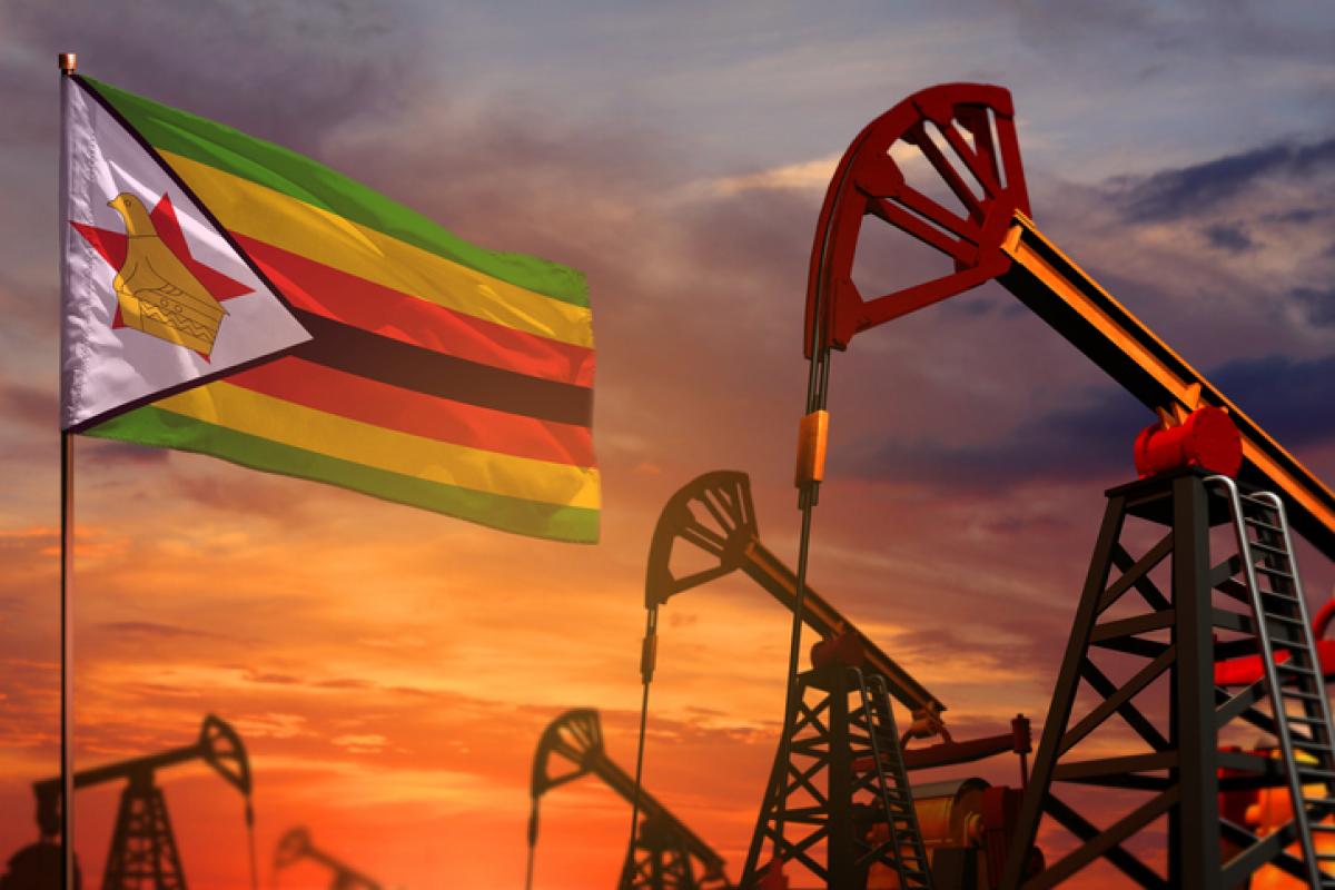 Ilustración de pozos petrolíferos con la bandera de Zimbabue ondeando.
