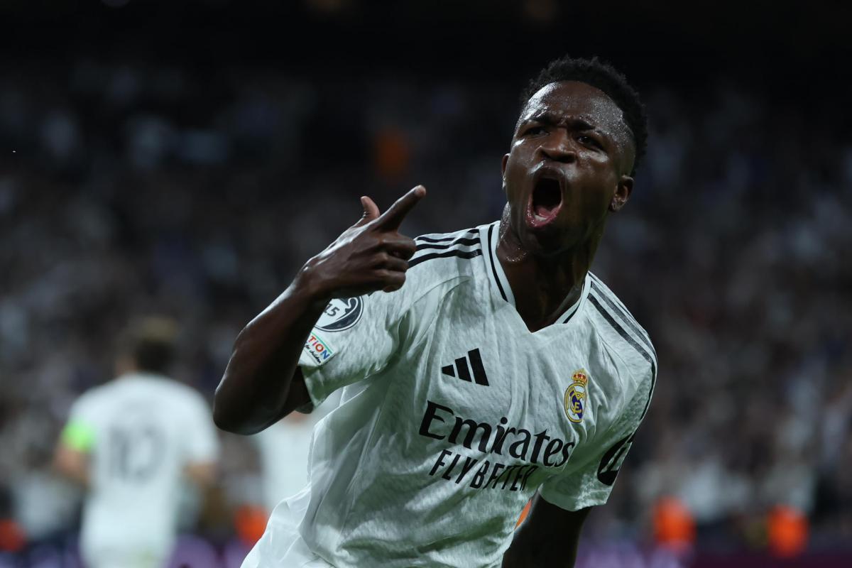 El delantero brasileño del Real Madrid Vinicius Jr. celebrando el primero de sus goles al Borussia Dortmund