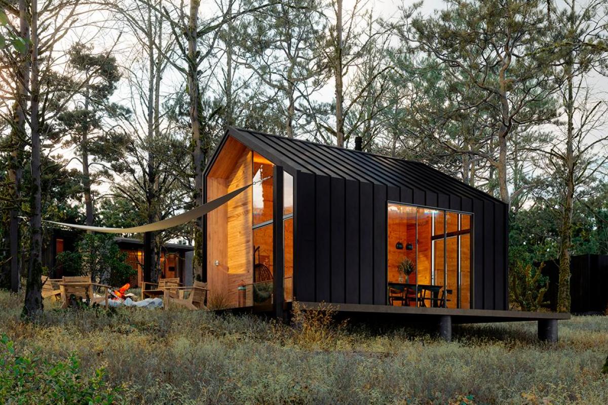 Una casa prefabricada en un bosque