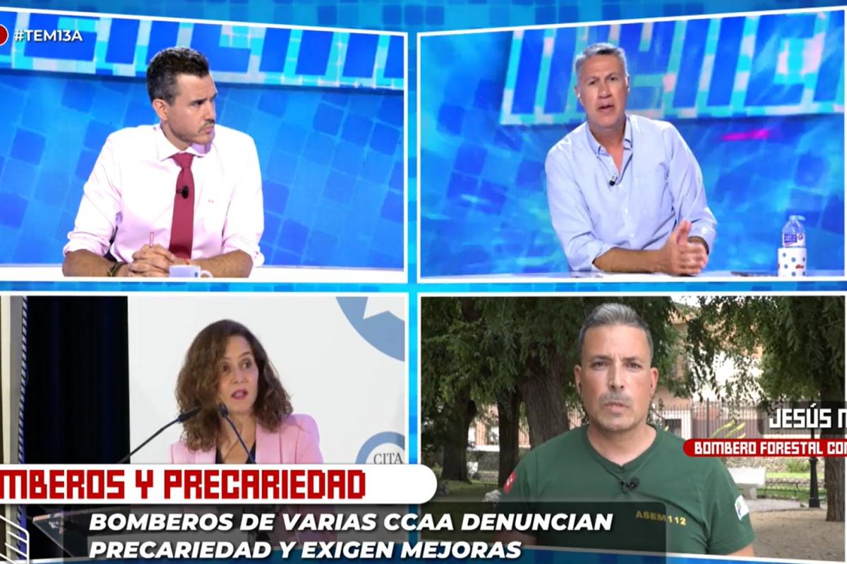 El momento entre Xavier García Albiol y el bombero Jesús Molina.