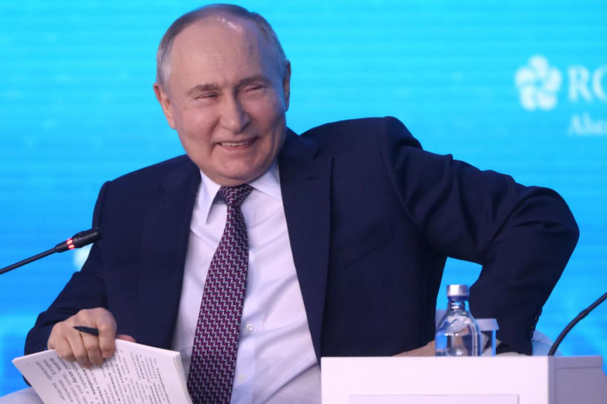 Vladimir Putin, echando unas risas