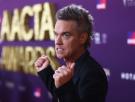 La reacción de Robbie Williams ante el deseo de su hija de ser cantante: "Eres una 'nepobaby', todo irá bien"