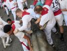 Catorce heridos en el quinto encierro de los Sanfermines, uno de ellos con una cornada en la cara
