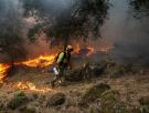 La UME da por contenidos todos los frentes del fuego en Madrid y Ávila, aunque persisten "varias cabezas activas"