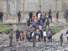 Empieza la instalación de las barreras de contención en el espigón del Tarajal tras una noche de normalidad en Ceuta