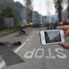 Un minero graba con su teléfono móvil en El Pozo (Asturias)