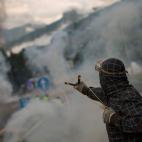 Un minero con tirachinas, lanzando piedras a la policía, en una protesta el 12 de junio en Campomanes, cerca de Oviedo. | Gtresonline