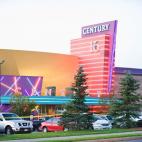 Police tape cordons off the parking area around the Century 16 movie theater in Aurora, Colorado, July 20, 2012 where a gunman opened fire during the showing of the new Batman movie. At least 12 people were killed and around 50 wounded in the ci...