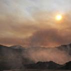Vista desde una granja de Viure destruida por el incendio.