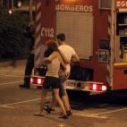 Las cuatro personas han quedado atrapadas en el interior de la cabina y han sido rescatadas por los bomberos.