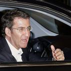 A su llegada a la sede del PP de Galicia