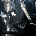 Riot policemen fight with demonstrators during a protest on a day of mobilisation against austerity measures by workers in southern Europe on November 14, 2012 in Rome. Riot police and anti-austerity protesters clashed in Italy on Wednesday as a...