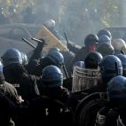 Riot policemen fight with demonstrators during a protest on a day of mobilisation against austerity measures by workers in southern Europe on November 14, 2012 in Rome. Riot police and anti-austerity protesters clashed in Italy on Wednesday as a...