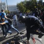 Police clash with protestors during a general strike in Madrid, Spain, Wednesday, Nov. 14, 2012. Spain's main trade unions stage a general strike, coinciding with similar work stoppages in Portugal and Greece, to protest government-imposed auste...