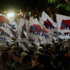 Demonstrators march to the Greek Parliament protesting against austerity measures in Athens on November 11, 2012. Thousands of protesters massed outside Greece's parliament Sunday as lawmakers prepared to vote on a 2013 budget that includes dra...