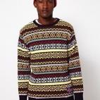 Si las supersticiones no te dan miedo, lánzate al amarillo (y a mazclarlo sin pudor). Jersey de Ski Jumper para Asos (69,45 €).