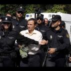 El padre de los dos niños custodiado por la polícia