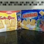 Un paquete de galletas Tosta Rica de Cu&eacute;tara (1,85 euros) y otro de galletas Animadas de Hacendado (1,49 euros).