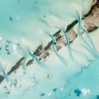 Un astronauta de la Estación Espacial Internacional fotografió estas pequeñas islas de las Bahamas y el cauce de las mareas que se entrecruzan entre ellas.