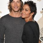 WEST HOLLYWOOD, CA - AUGUST 06: Actress Halle Berry (R) and Gabriel Aubry attend the launch event for Gap's 1969 Jean Shop on Robertson Blvd at their 1969 Jean Shop on August 6, 2009 in West Hollywood, California. (Photo by John Shearer/Getty ...