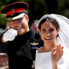 Mayo de 2018. El pr&iacute;ncipe Harry y Meghan Markle saludan tras su boda.