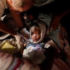 Enero de 2010. Un ni&ntilde;o herido es atendido tras el terremoto que asol&oacute; Puerto Pr&iacute;ncipe (Hait&iacute;).