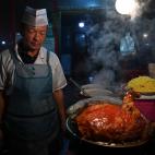 Cocina típica en un restaurante de los uigur en Shayar