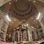 Pope Benedict XVI (C) leads the Vesper prayer with members of Rome's universities on December 15, 2011 at St Peter's basilica at The Vatican. AFP PHOTO / ANDREAS SOLARO (Photo credit should read ANDREAS SOLARO/AFP/Getty Images)