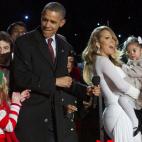 Junto al presidente Obama durante el encendido navideño.
