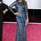 Con vestido de Roberto Cavalli, zapatos de Giuseppe Zanotti, 'clutch' Jimmy Choo y joyas Sutra.