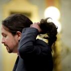 Iglesias se arregla la coleta.