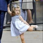 Jugando en la primera comunión de sus primos Juan y Pablo Urdangarin, en Barcelona en 2009