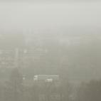 KRAKOW, POLAND - 2018/12/13: Smog is seen above the residential areas. Today, due to the high levels of air pollution above EU norms, the air quality index (AQI) of PM 2.5 is over 163. The city council introduced free public transport for safet...