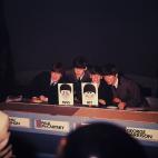 11th December 1963: The Beatles pictured during their appearance on the music panel show, Juke Box Jury; pictured left to right are: John Lennon (1940 -1980), Paul McCartney, Ringo Starr and George Harrison (1943 - 2001). (Photo by Hulton Arch...