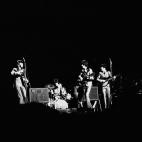 British pop group the Beatles perform on stage, 1964. (L-R) Paul McCartney, Ringo Starr (behind drum kit), George Harrsion (1943 - 2001), and John Lennon (1940 - 1980). (Photo by Ralph Morse/Time Life Pictures/Getty Images)