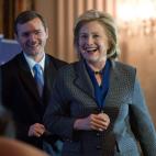 Former U.S. Secretary of State Hillary Clinton smiles after receiving the 2013 Lantos Human Rights Prize during a ceremony on Capitol Hill in Washington on December 6, 2013. (Photo credit should read NICHOLAS KAMM/AFP/Getty Images)