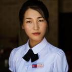 Una empleada de hotel en Sinuiju.