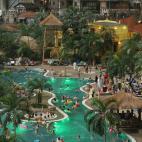 Visitors swim in a lagoon. (Photo by Sean Gallup/Getty Images)