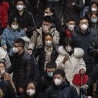 Las mascarillas se han convertido en un elemento básico de seguridad para la población china